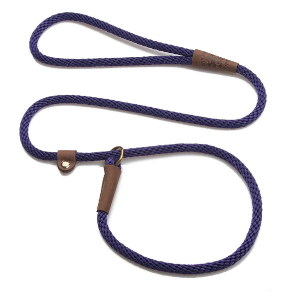 Navy purple rope slip lead with brown leather stopper and ring, coiled on white background